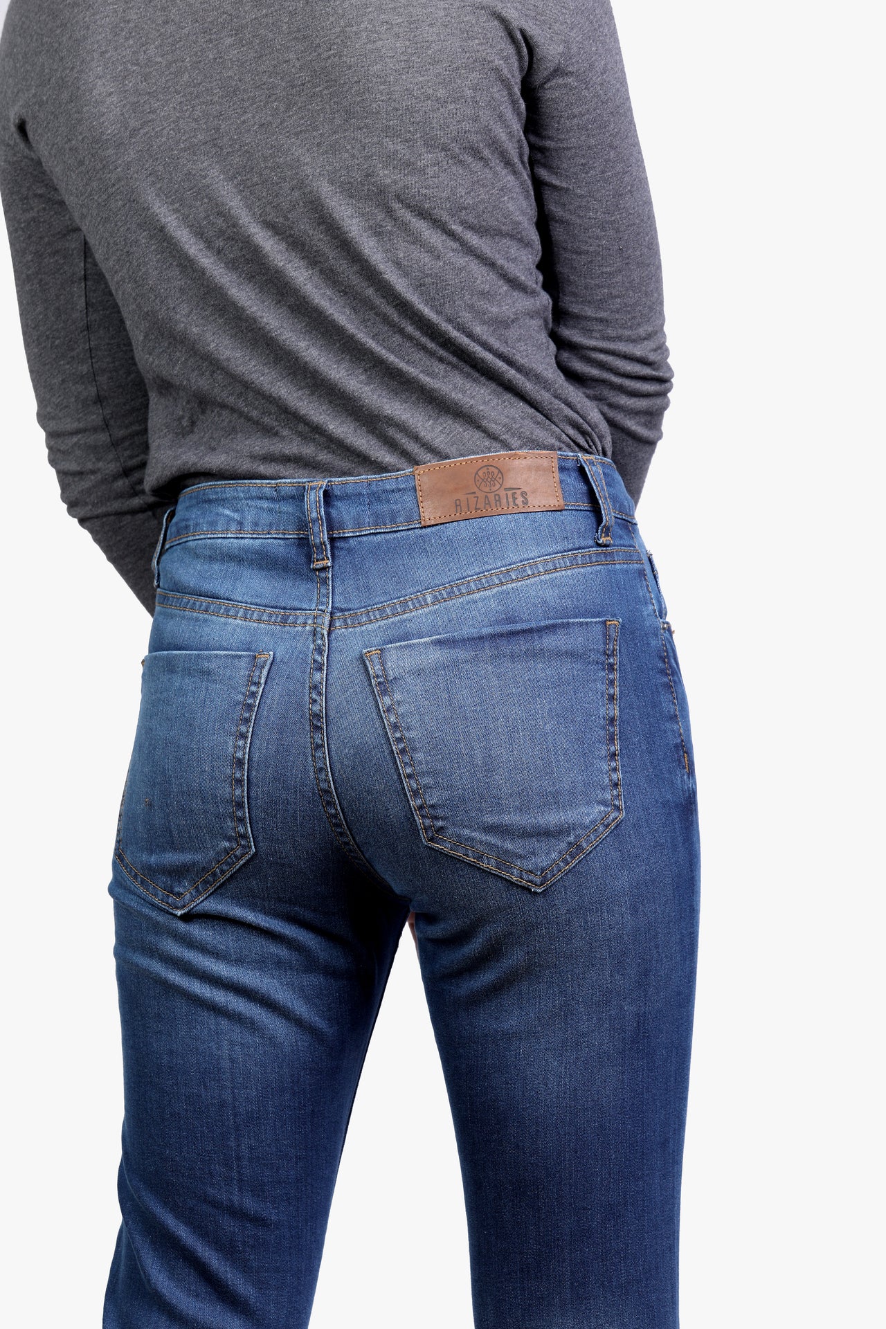 Asymmetric Hems Classic Blue Mid Rise Denim Jeans